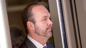 Gates testifies millions of dollars moved through accounts hidden overseas