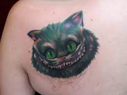 Cheshire cat tattoos von alice im wunderland. Mg Tattoo Katze Grinsekatze Alice Im Wunderland Tattoos Von Tattoo Bewertung De