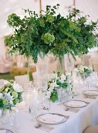 Style Me Pretty Trending High Centerpieces That Will Green Centerpieces Tall Wedding Centerpieces Greenery Centerpiece
