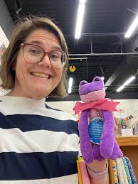 Woohoo! I found "Lucy" at Material Girls Quilt Boutique! Lucy was found  tucked into the pocket of the beautiful, functional and reversible apron  I'm standing beside. How to make this amzing apron