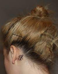What does the feather behind the ear tattoo mean? Behind Ear Name Tattoo Ideas Initial Tattoo Couple Tattoos Tattoos