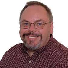 Scared off fox chasing young man walking dog