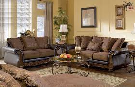 Living room sets sofas & loveseats sectionals sofa chaises accent chairs recliners reclining sofas sleepers & futons benches cocktail tables if you are in the orland park, chicago, il area and looking for new furniture for your home visit darvin furniture today. Walnut Fabric And Faux Leather Sofa Loveseat Set By Ashley