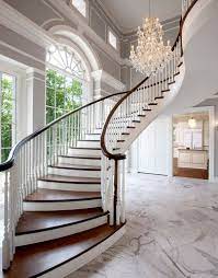 All the spaces flow into one another, and the idea of distinct rooms dissolved. Traditional Staircase Design By Milwaukee Architect Wade Weissmann Architecture Staircase Design Traditional Staircase Stairs Design