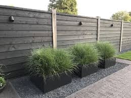 We especially love how black exteriors look alongside wood siding. Home Exterior With Black Coating Black Painted Exterior Cladding Fashionable Moder Tech Monstylestar Com