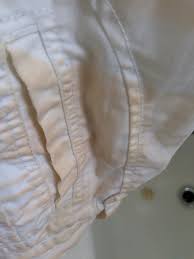 When it comes to old stains, you might need to try different methods for different materials. Removing Yellow Discoloration From White Pants Thriftyfun