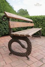 Ace reclamation supplying architectural salvage, reclaimed building materials, railway sleepers, new and used scaffold boards, antique furniture and vintage interiors, in the uk and worldwide. Cast Iron And Reclaimed Teak Serpent Bench