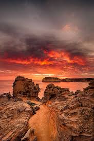 Fire In The Sky The Cove Bay Of Islands Victoria Australia By Atoulmin Wonders Of The World Beautiful Places Scenery
