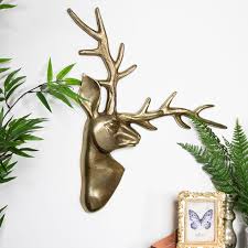 This is the chosen medium for the handmade. Gold Metal Stag Wall Art