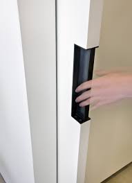 When you pull your pocket doors shut, you don't want a random bump or wind gust so send them gliding open again. 44pl Joeb Moore Partners Architects Llc Door Handles Modern Pocket Door Handles Barn Door Handles