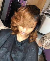 Recreate that, or you can try the hairdo in a different shade. Golden Brown Sew In Bob With Swoop Bangs Black Hair Tribe