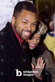 Image of Jesse Jackson Jr. and his wife, Sandra Jackson, leave their
