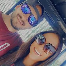 Who can do a haircut and color with blond and purple highlights in  Flagstaff?