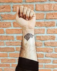 20 stunning game of thrones tattoos that you'll love. No Spoilers House Stark Tattoo Music Indieartist Chicago Game Of Thrones Tattoo Cute Small Tattoos Tattoos