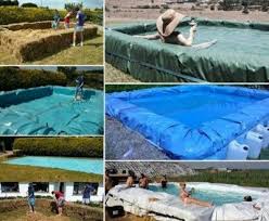 How To Build A Hay Bale Tarp Soaking Water Pool The Homestead Survival Swimming Pool Pictures Outdoor Backyard Pool