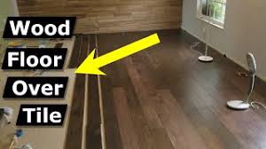 Glue wood to tile are user friendly and come with longer shelf life. Install Hardwood Flooring Over Tile Floor Double Glue Down Method Youtube