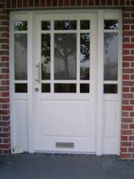 Holz Haustur In Delbruck Mit Sprossen Haustur Landhaus Haus Hausturen Landhausstil