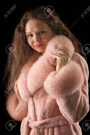 Himalayans are very sweet and playful cats, but don't let their laid back personalities fool you—their long coats require daily maintenance to prevent mats and tangles. A Beautiful Romantic Girl In A Pink Fur Coat With Long Hair Looks Stock Photo Picture And Royalty Free Image Image 4635764