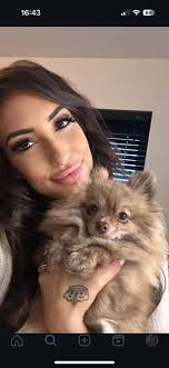 My eldest with our adventurous blue merle pom Salem. One of my absolute  favorite photos and memories. ❤️