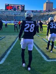 Buffs uniforms for the final regular season game: 🏈 white helmet 🏈 black  jerseys 🏈 white pants 🏈 black socks