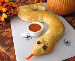 21 Halloween Dinner And Appetizer Ideas That Are A Total Scream Halloween Food For Party Halloween Dinner Halloween Appetizers