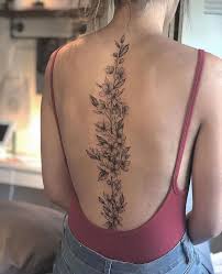 Airbrush style tattoo that this delicate shows excerpts as a small tree trunk was young. 31 Beautiful Spine Tattoo Ideas For Women Inspirationfeed