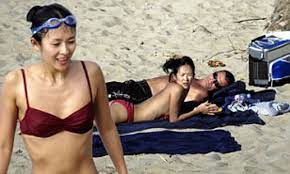 Zhang Ziyi pictured frolicking on beach with billionaire ex-fiancé Aviv  'Vivi' Nevo | Daily Mail Online