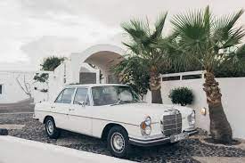 Elegant Destination Wedding In Santorini Tie The Knot In Santorini Weddings Events Santorini Wedding Santorini Bridal Car