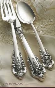 Hinged top tea pot 5 1/4 inches diameter, 9 inches high, 10 inches handle to spout. Grande Baroque By Wallace Sterling Silver Flatware
