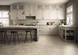 The grey of this kitchen island contrasts the bright white of the cupboards while the backsplash adds a bit of color to the room. Off White Kitchen Floor Tile Google Search Pol Kuhni Kuhonnyj Pol Interer Kuhni