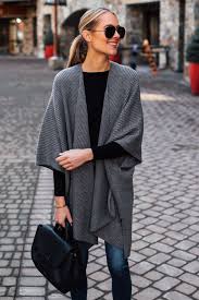 Blonde Woman Wearing Grey Sweater Poncho Black Top Denim Skinny Jeans Polene Black Handbag Fashion Jackson San Diego Fashion Fashion Jackson Fashion Women Wear