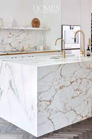 Few things are as luxurious as a marble kitchen. Modern Kitchen Design With Marble And Gold Scheme Latest Kitchen Designs Modern Kitchen Design Kitchen Decor Trends