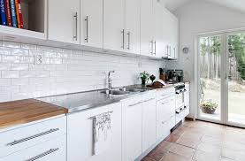 Superb White Tile Backsplash In Designing Home Inspiration With White Tile Backspl White Kitchen Interior Interior Design Kitchen White Tile Kitchen Backsplash