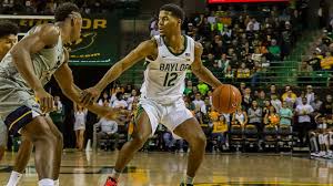 Baylor guard jared butler (12) celebrates with teammate adam flagler during final four game against gonzaga at lucas oil stadium in indianapolis. Baylor S Jared Butler To Return For Junior Season