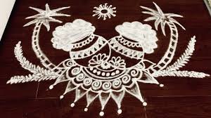 In mid of the rangoli cow dung rolls decorated with yellow or red flowers are made and kept. Sankranthi Muggulu Pongal Kolam 2021 Pongal Rangoli Kolam Pongal Rangoli Designs Muggulu New Youtube