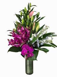 Maybe you would like to learn more about one of these? Mixed White Purple Flowers In A Vase Flowers By Jane