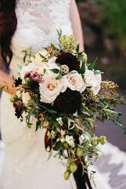 Cascading autumn fall wedding bouquets. A Touch Of Burgundy A Romantic Autumn Wedding Summerrobbinsflowers Com A Touch Bridal Bouquet Fall Blush Wedding Flowers Wedding Flower Arrangements Fall