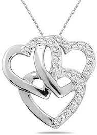 Maybe you would like to learn more about one of these? 1 4 Carat Triple Heart Diamond Heart Necklace