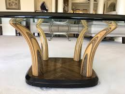 The elephant glass top coffee tables has an beneficial purpose, it requires to keep cups of coffee, magazines, newspapers, books, food, drink, even media players. Stunning Henredon Wooden Faux Elephant Tusk Coffee Table With Glass Top 44 W X 16 H