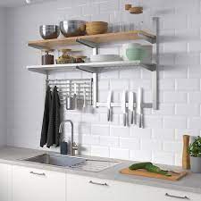 Ikea kitchen wall cabinets are hung on a rail system. Kungsfors Wall Storage With Grid Knife Rack Stainless Steel Ash Veneer Ikea