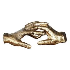 An elegant statue featuring a pair of wedding hands atop roses; Gold Entwined Hands Sculpture Statue Friendship Romantic Wedding Contemporary