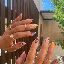 The gel pink nails look normal at first but then what appears to be clay models of jenner's thumb and stormi's hand are glued onto one finger. Summer Nail Art Designs Mismatched Nail Art Trend Easy Nail Art Ideas Instyle