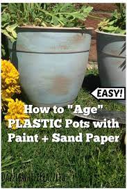 No matter your design, let your add a bit of potting soil and repot your plant. Make Plastic Flower Pots Look Old With Paint Flower Paint Plastic Pots Plastic Flower Pots Flower Pots Outdoor Plastic Flowers