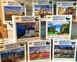 It features a beautiful folk art painting of green pastures, friendly villagers, and a bright blue sky overhead. Our Worlds Smallest Jigsaws Are Now Start And Tremayne Facebook