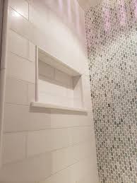 Glass mosaics are one of the easiest ways to add pops of color shine and shape to your shower recessed shelf or backsplash. Showers Mass Flooring Pro
