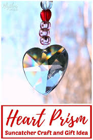 If your home could really use some joyful decoration, check out how the jersey momma made this colored glass suncatcher! Hanging Heart Suncatcher Prism Crafts Rhythms Of Play