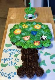 Birthday Cupcake Cake Ideas For Boys 1st Birthday Jungle Themed Pull Apart Cupcake Cake Smash Cake Jungle Animals Baby Boy Baby Shower Cupcakes For Boy Birthday Cupcakes Boy Jungle Theme Cupcakes