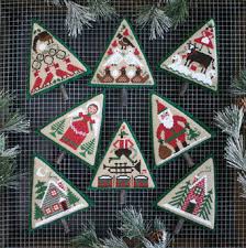 These are eleven traditional christmas themed patterns. Prairie Schooler O Christmas Tree Cross Stitch Pattern 123stitch