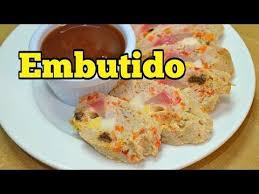 Filipinos Make The Best Pork Embutido Recipe By Steaming Ground Pork Eggs Sliced Hotdogs Raisins Cheddar Ch Embutido Recipe Pork Embutido Recipe Recipes