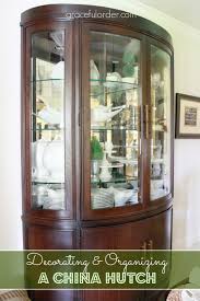 How to organize a china cabinet. Decorating A China Cabinet Hutch Graceful Order
